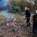 London Wildlife Trust Volunteers at Gunnersbury Triangle burning brash