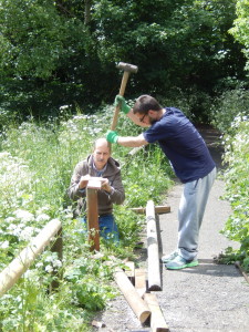 Driving in posts for wooden railing