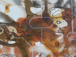 Detail of PCB layout among earth pigments in one of Gail's paintings